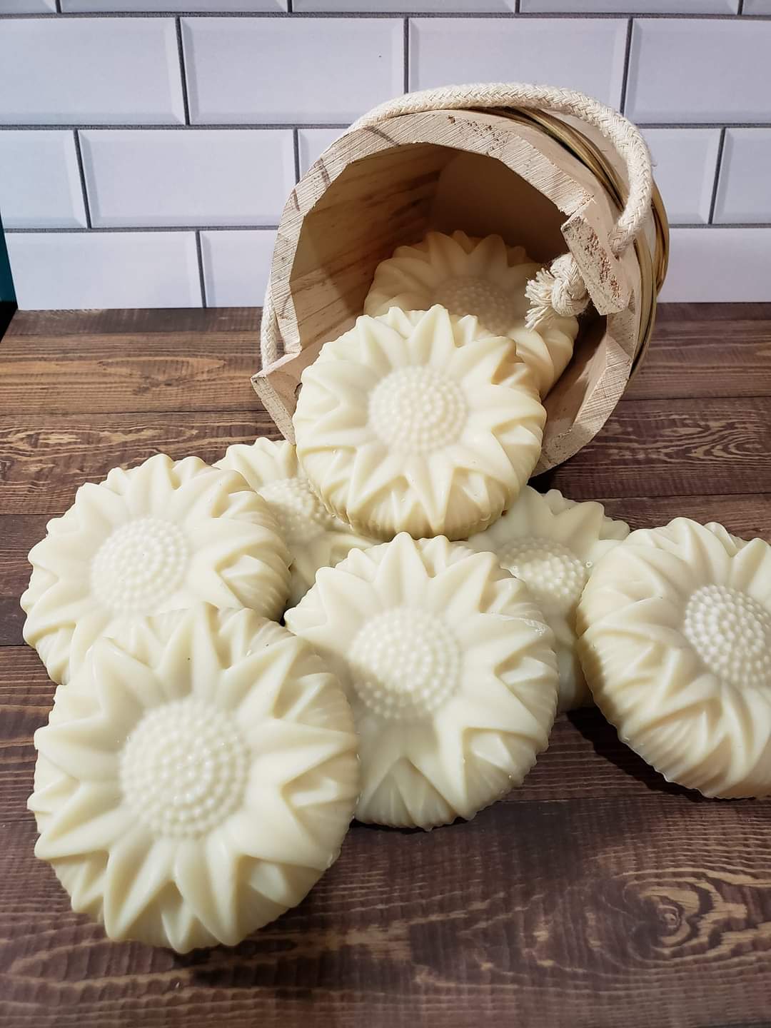 Basket with sunflower soaps pouring out.